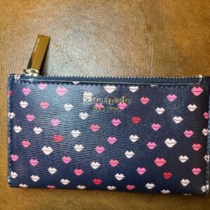 EUC Kate Spade New York Sylvia slim bifold wallet.